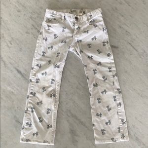 White jeans with blue bicycle